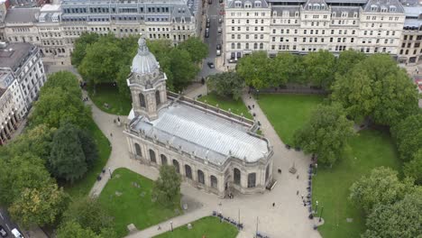 drone shot orbiting birmingham's st philip's cathedral