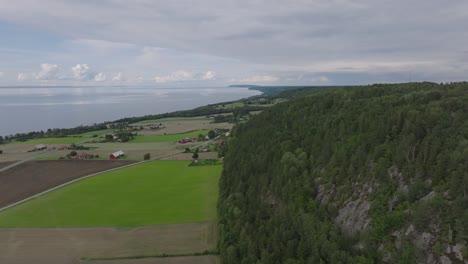 Swedish-Village-And-Forest-Mountains-Near-Vattern,-Sweden