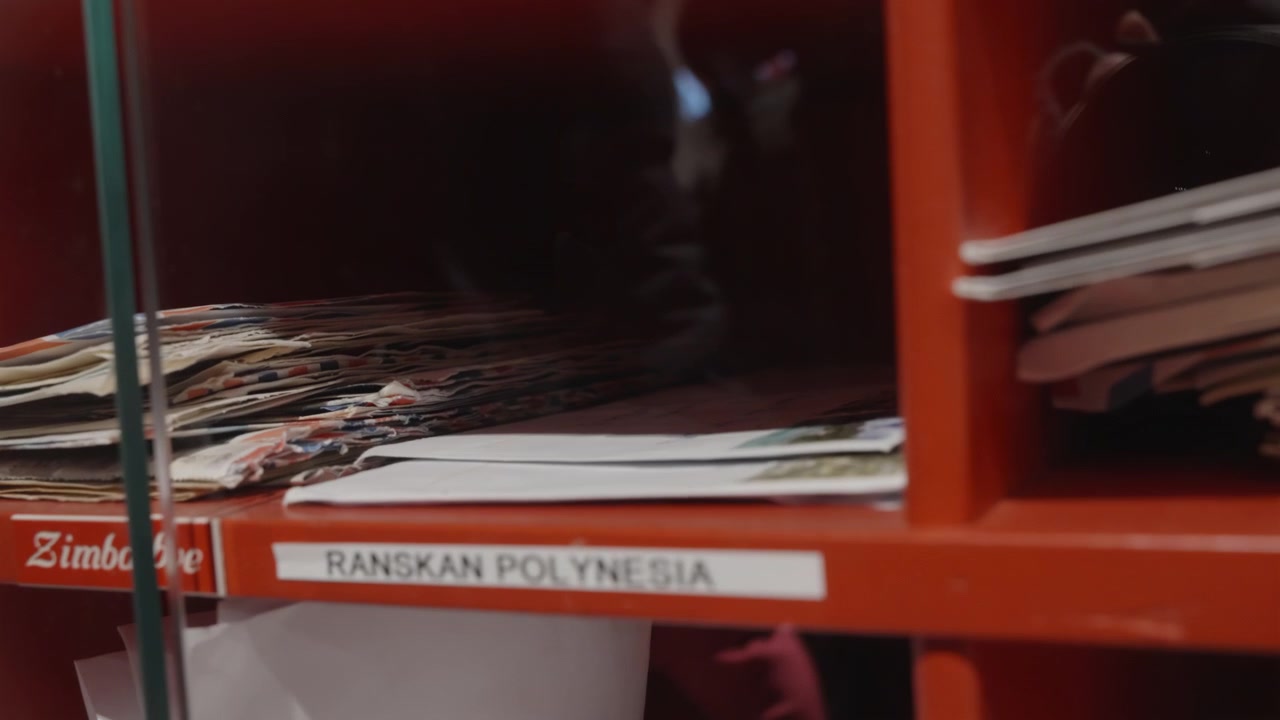 Close-up of Organized Mail Slots in a Post Office