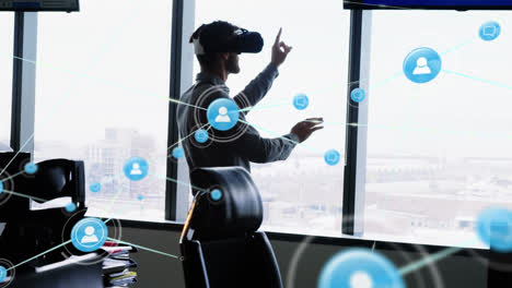 Animation-of-networks-of-connections-and-businessman-wearing-phone-vr-headset