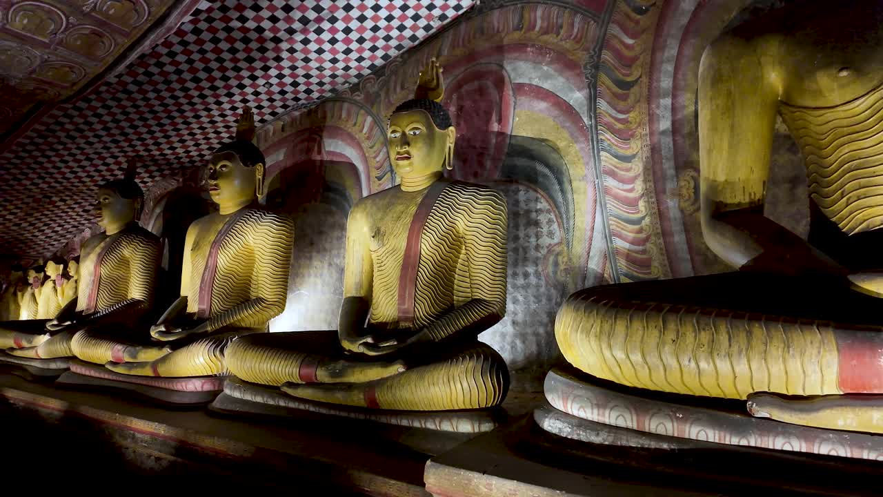 Ancient Buddha Statues in a Cave Temple