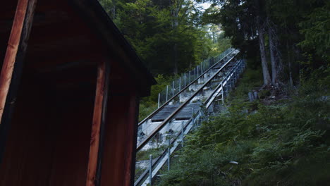 funicular lift railway platform and wooden cabin at