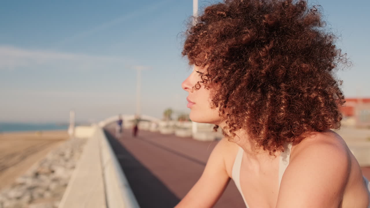Young Woman Resting After Fitness Training