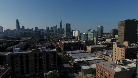 aerial view of chicago cityscape skyline from downtown neighborhood on sunny day