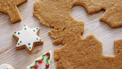 gingerbread dough with star shapes on wooden table 4k