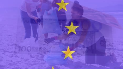 Animation-of-flag-of-eu-and-banknotes-over-diverse-volunteers-cleaning-beach