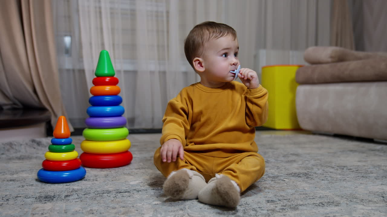 Toddler Playing with Stacking Rings