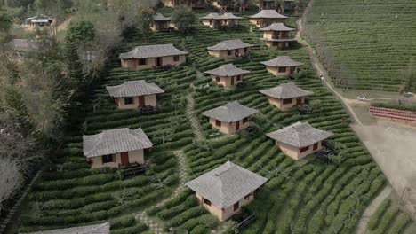 reveal back shot of the japanese houses in thailand mountains