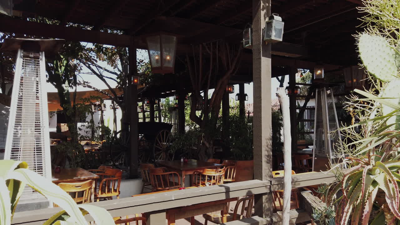 San Diego, California - September 26, 2021: Bright shots of Old Town San Diego's Fiesta de Reyes and Barra Barra Saloon, decorated with cacti, fountains, and festive details