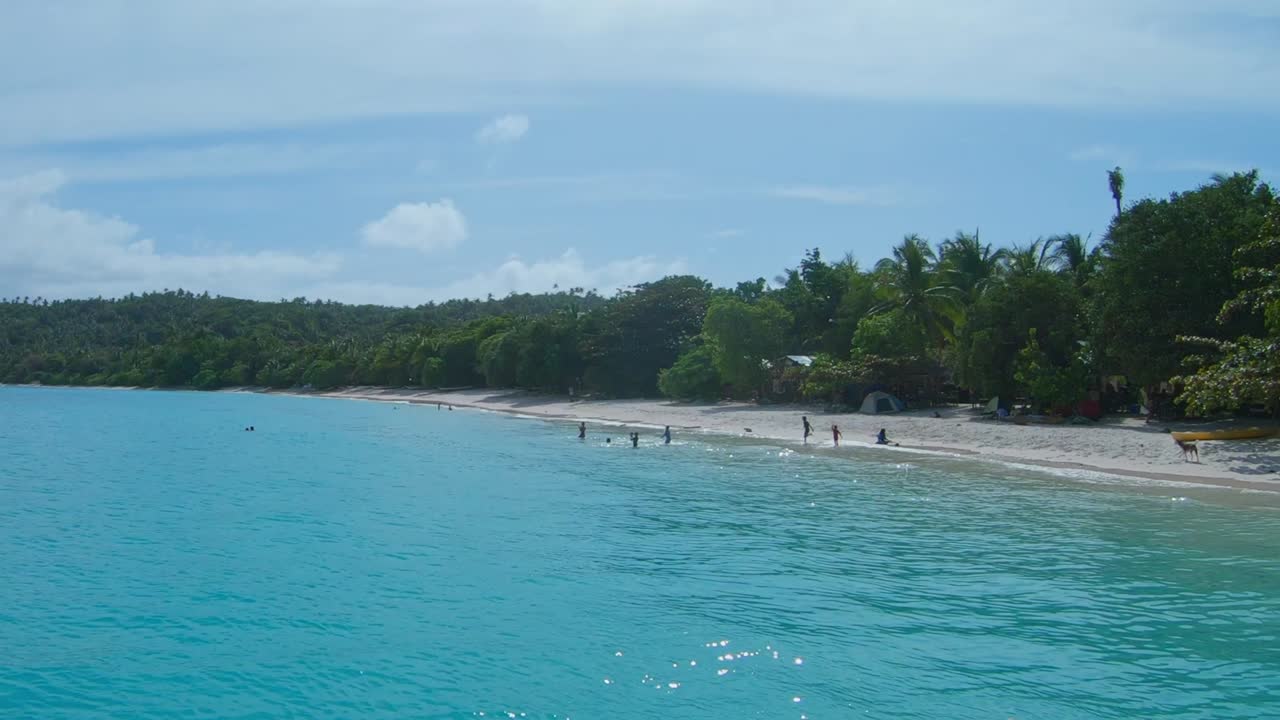 kids playing at subic beach calintaan island matnog philippines