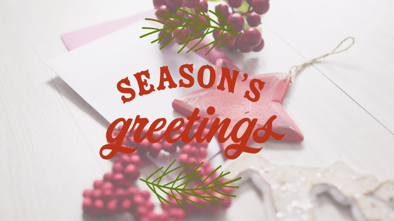 Animation of seasons greetings text over christmas decorations