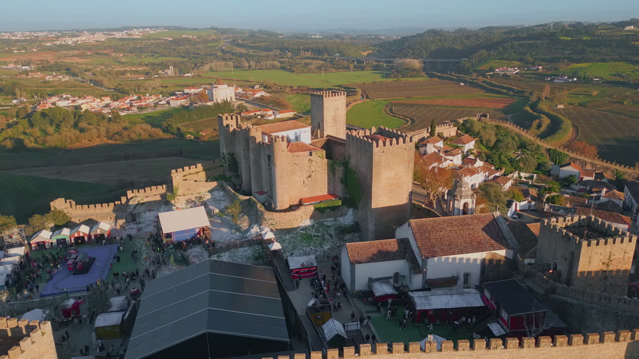 Aerial touristic city medieval castle at countryside. Historic architecture