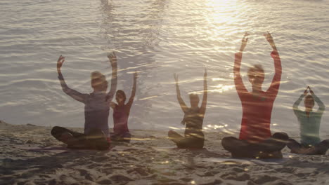 animation of glowing light over senior women practicing yoga by seaside