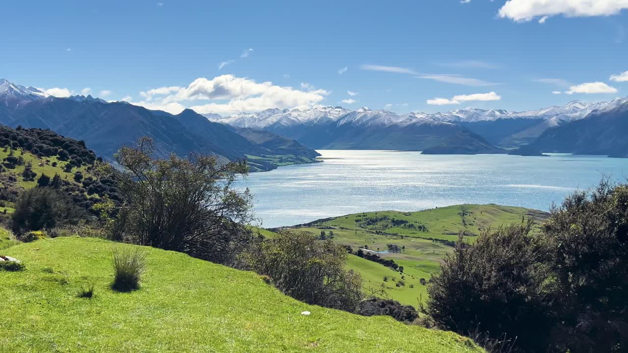 Stunning lake and mountain view on a sunny day at Lake Hawea, New Zealand