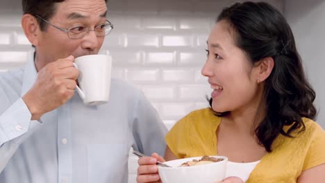 Asian-couple-having-breakfast-together-