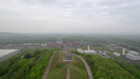 Zeche-Ewald-and-viewing-platform-on-stockpile-Hoheward,-old-mine,-aerial-drone-view