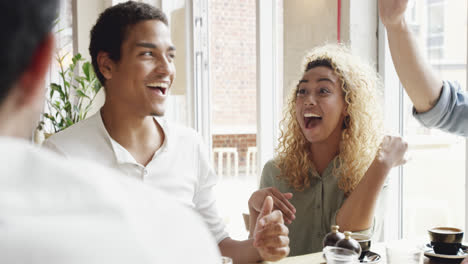 group of friends celebrating in slow motion happy party smiling laughing