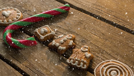 nieve cayendo con dulces de navidad decoraciones