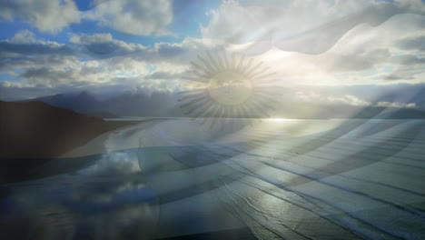 digital composition of argentina flag waving against aerial view of waves in the sea