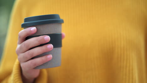 traveller relaxing with beverage with blurred