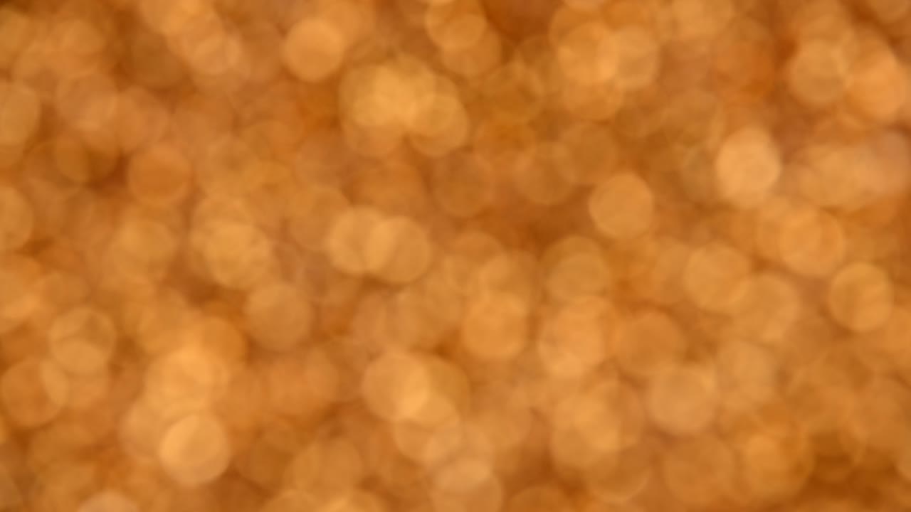 fondo abstracto de hilado de bokeh dorado