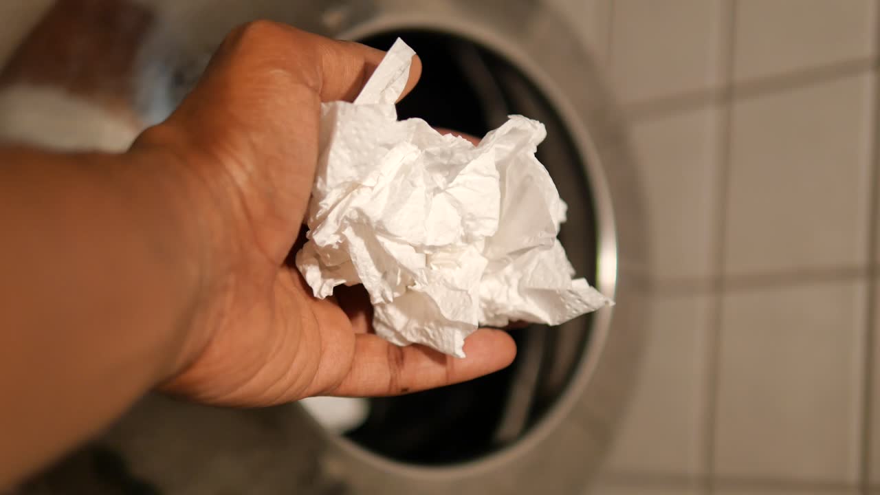 Discarding a used paper towel