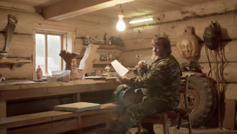 woodcarver at work in a rustic workshop