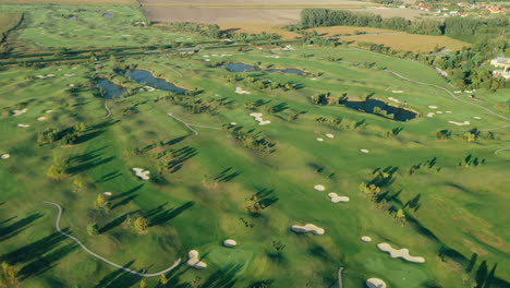 aerial birds eye footage of a golf course in bac, near bratislava in slovakia