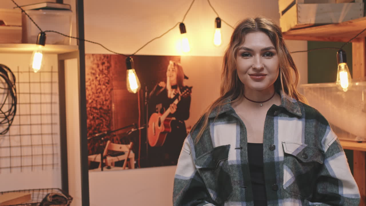 Rock-n-Roll Woman Playing Synth In Studio