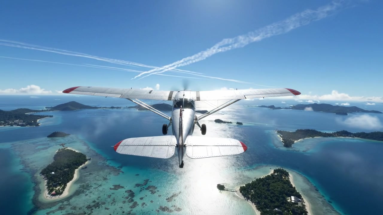 Splendida Vista Aerea di un Aereo d'Epoca Sopra Acque Tropicali Cristalline e Isole Lussureggianti Sotto un Cielo Azzurro Brillante con Scie di Condensazione sullo Sfondo
