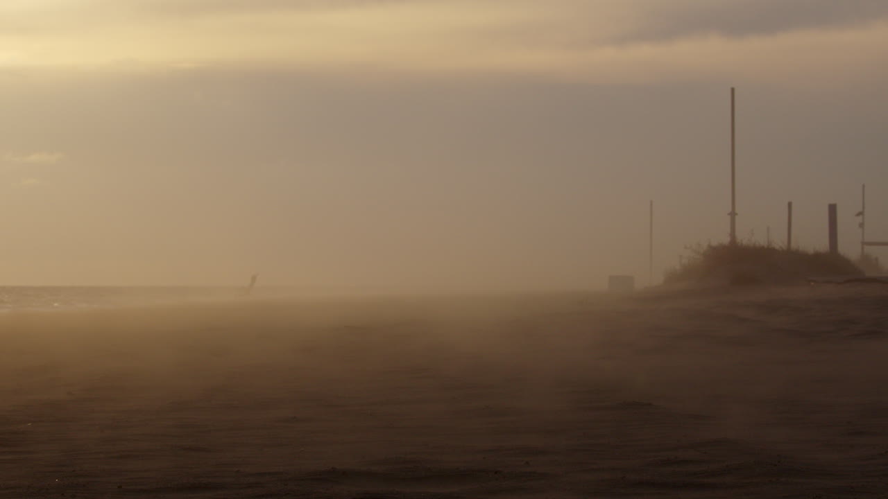Deserted Beach on a Windy Sunset