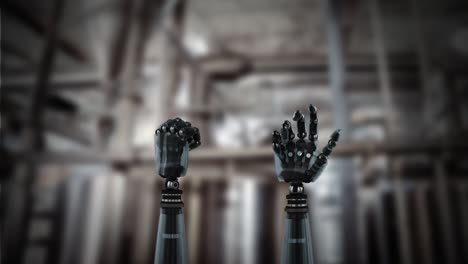 robot hands and blurred industrial background