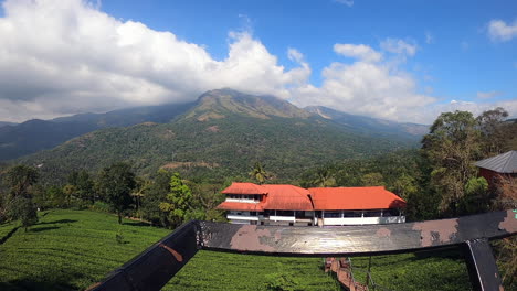 a 4k beautiful time-lapse of a beautiful scenery with rain forest, lake and mountains with a foggy climate taken from kerala, india