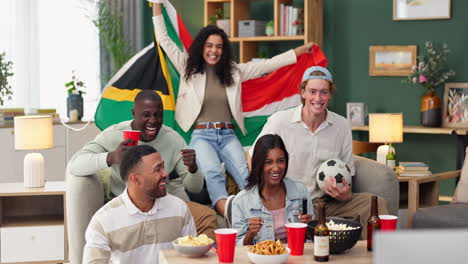 friends celebrating soccer match at home