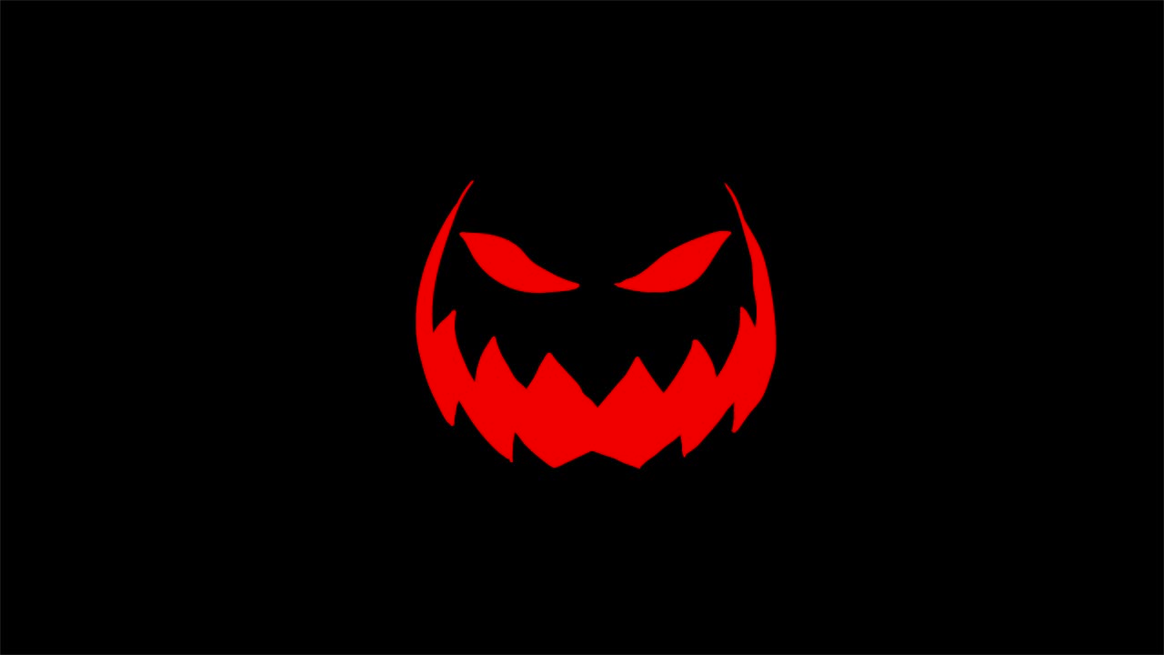 Red teeth and eyes on a black background