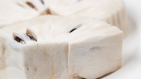 Soursop-fruit-on-a-plate-on-table-,