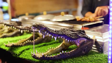 crocodile display at ao nang night market