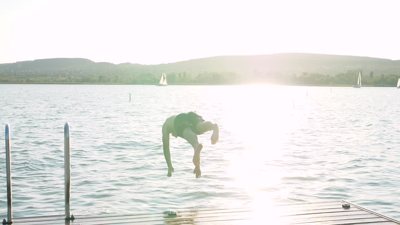 Happy And Energetic Man Plunges Into Water, Sunny, Motivational Environment