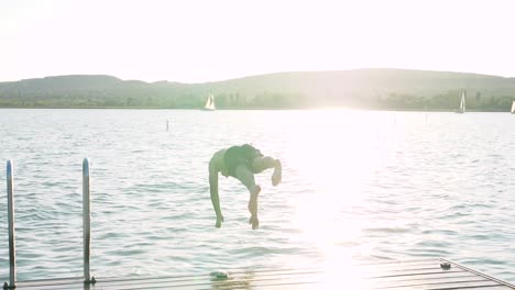 happy and energetic man plunges into water, sunny, motivational environment