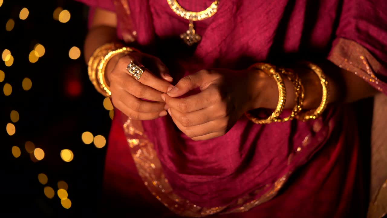 Woman Holding Diya