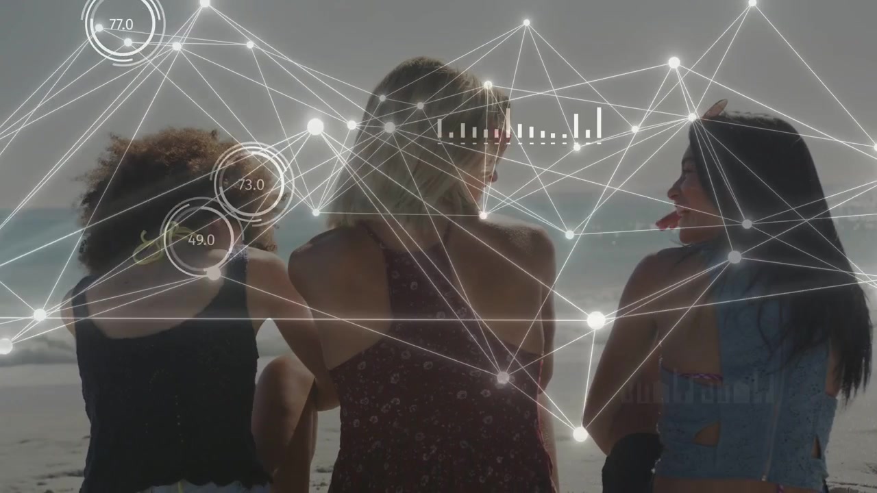 Overlay appearing guiding 3 women turning toward each other on beach tech charts mapping metrics