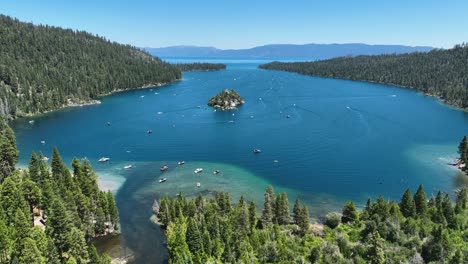 aerial view over trees toward the emerald bay, sunny, summer day in tahoe, usa