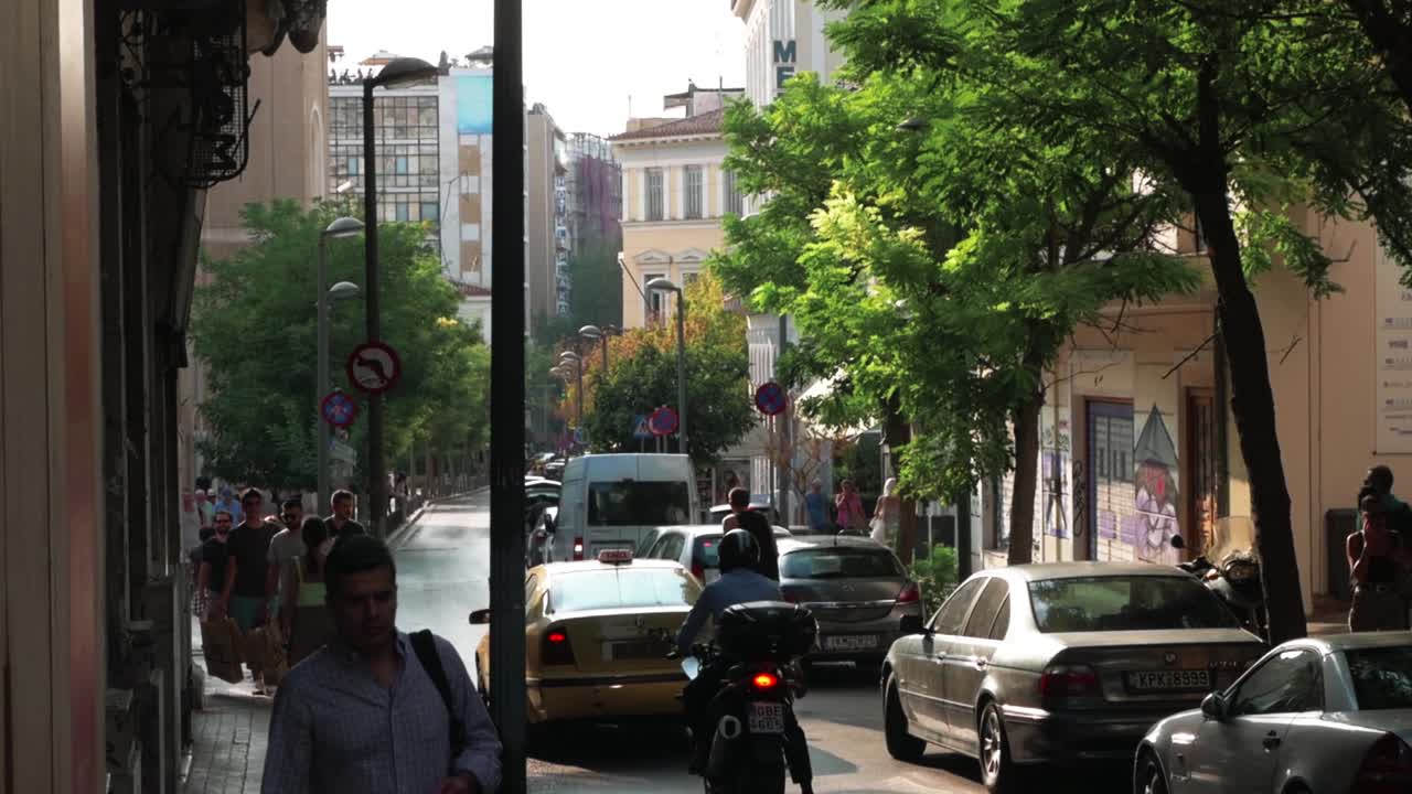 Busy Streets of Greece. Downtown Athens was alive with People, Art, Culture, Music, Business, and Graffiti