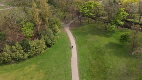 early bird cyclist paving through at locke park barnsley england