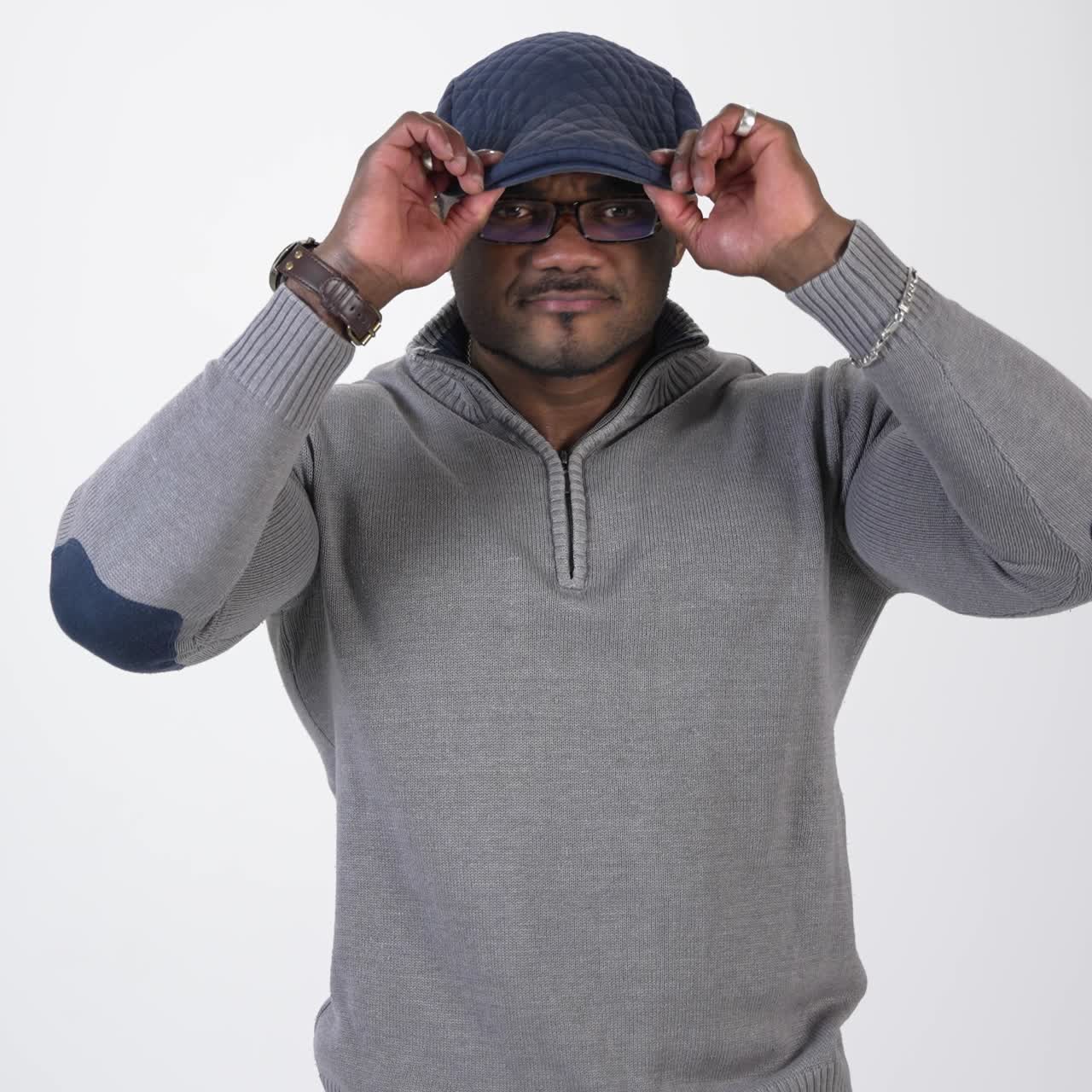 Portrait of african athlete. Studio shot of muscular man posing against grey background