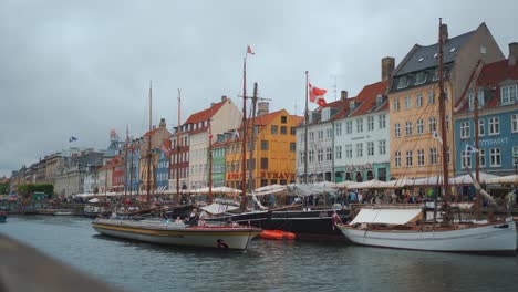 nyhavn copenhagen historic city center, denmark. colorful traditional houses along harbor. tourism sightsseeing.