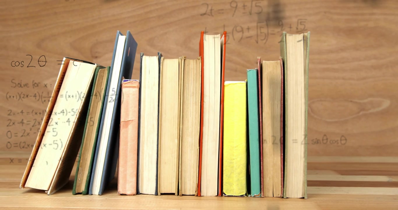 Handwriting sin2? formula starting equations showing on books plotting axes and graphing curve