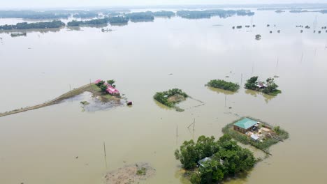 severe flood submerged school and houses at a village. flood damage in bangladesh. vertigo effect