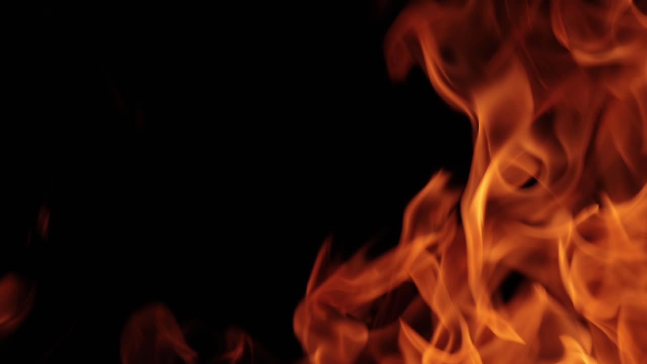 Flames of fire on black background in slow motion