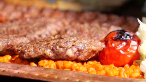 appetizing grilled kebab with accompaniments
